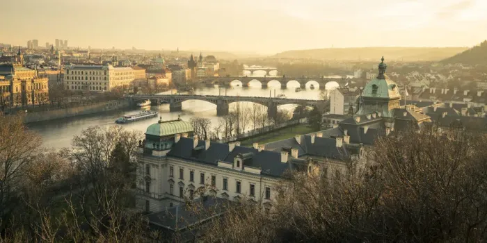 Framed Print : Bridges over Vltava river and Straka Academy against sky seen from Letna park at sunset Framed Print : Bridges over Vltava river and Straka Academy against sky seen from Letna park at sunset