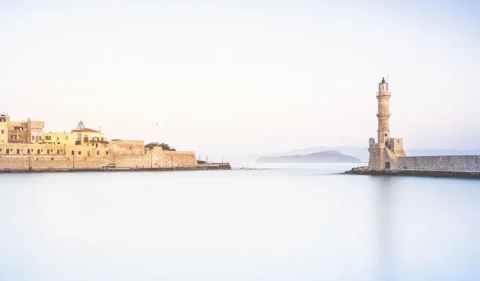 Framed Print : Bright sunrise over the Venetian lighthouse and Chania old town, Crete, Greece Framed Print : Bright sunrise over the Venetian lighthouse and Chania old town, Crete, Greece