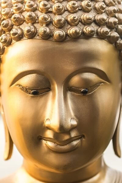 Buddha face, Seema Malaka temple on Beira Lake. Colombo, Sri Lanka