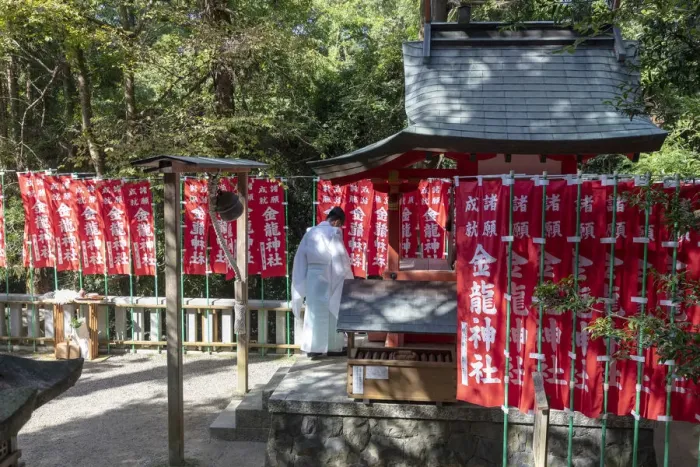 Framed Print : Buddhist monk prays near Kasugataisha Shrine, Nara, Japan