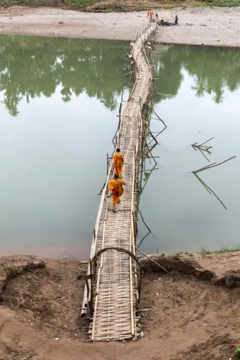Framed Print : Two buddhist monks walk across bamboo bridge, Luang Prabang, Louangphabang Province, Laos Framed Print : Two buddhist monks walk across bamboo bridge, Luang Prabang, Louangphabang Province, Laos