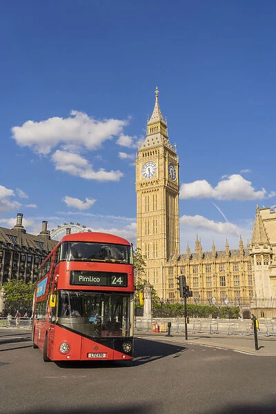 A bus on Parliament Square and Big Ben, also known as Elizabeth Tower. Part of the Houses of Parliament and a Unesco World Heritage site, London, England, UK