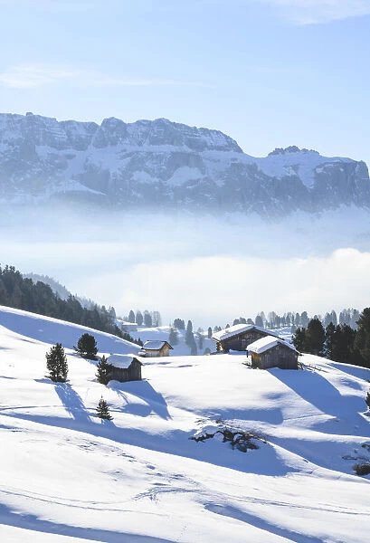 Some cabins under the snow in Gardena VAlley, south Tyrol, Italy