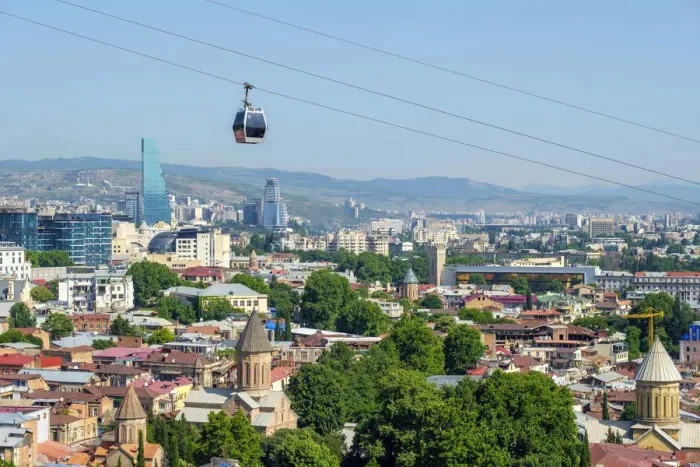 Framed Print : Cable car between Rike Park and the Narikala fortress passes above buildings in central