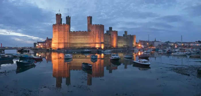 Framed Print : Caernarfon Castle at dusk Gwynedd, Wales Framed Print : Caernarfon Castle at dusk Gwynedd, Wales