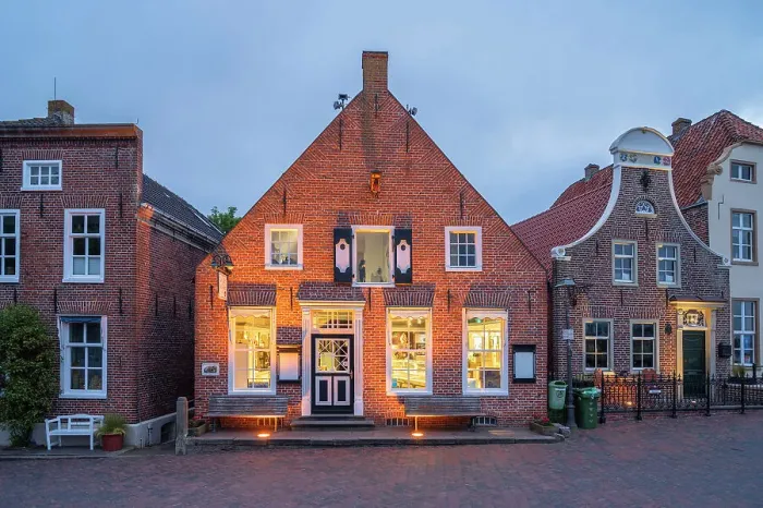 Framed Print : Cafe at Greetsiel in the evening light, Krummhorn, East Frisia, Lower Saxony, Germany