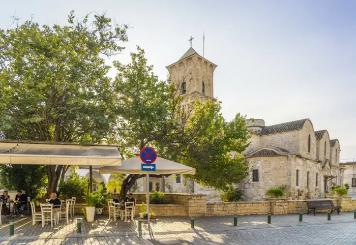 Framed Print : Cafe scene and The Church of Saint Lazarus, or Ayios Lazaros Framed Print : Cafe scene and The Church of Saint Lazarus, or Ayios Lazaros