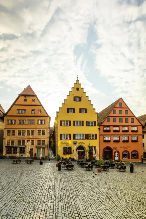 Framed Print : Cafes and colourful buildings at the market square, Rothenburg ob der Tauber, Germany Framed Print : Cafes and colourful buildings at the market square, Rothenburg ob der Tauber, Germany