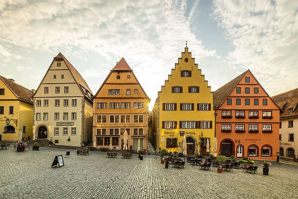 Cafes and colourful buildings at the market square, Rothenburg ob der Tauber, Germany