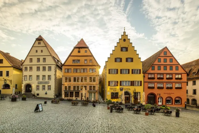 Framed Print : Cafes and colourful buildings at the market square, Rothenburg ob der Tauber, Germany Framed Print : Cafes and colourful buildings at the market square, Rothenburg ob der Tauber, Germany
