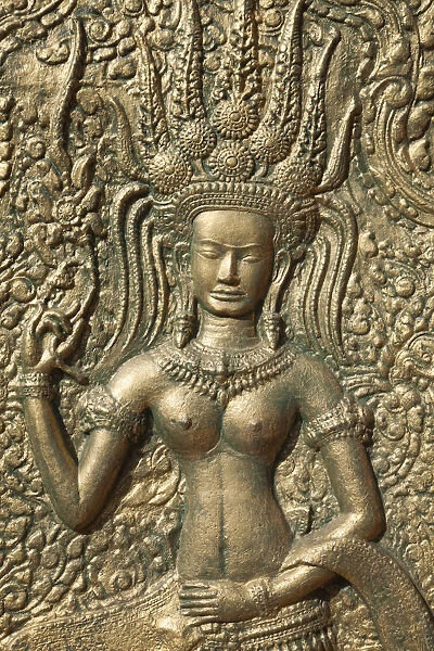 Cambodia, Phnom Penh, Wat Phnom, Wall Relief depicting Apsara Dancer