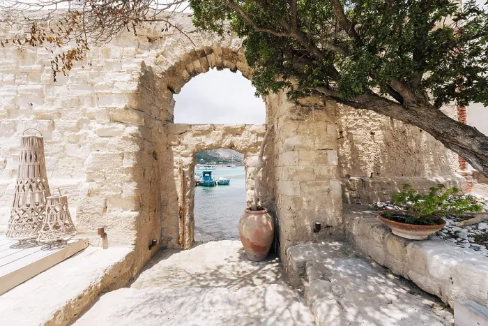Framed Print : Camparia, Favignana, Italy. Boats in harbor viewed through stone archway Framed Print : Camparia, Favignana, Italy. Boats in harbor viewed through stone archway