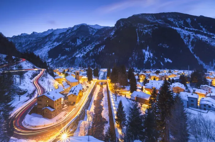 Framed Print : Campodolcino village lights up at dusk after a snowfall, Spluga valley, Sondrio province Framed Print : Campodolcino village lights up at dusk after a snowfall, Spluga valley, Sondrio province