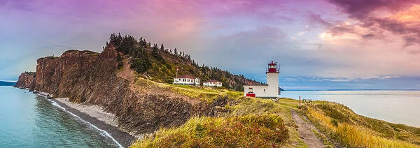 Canada, Nova Scotia, Advocate Harbour, Cape d Or Lighthouse on the Bay of Fundy, dusk
