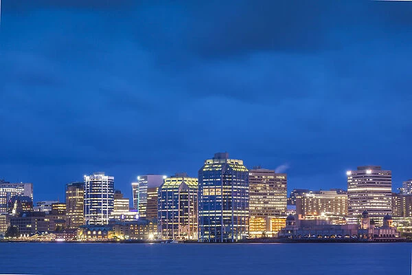 Canada, Nova Scotia, Halifax, Halifax city skyline from Dartmouth, dusk