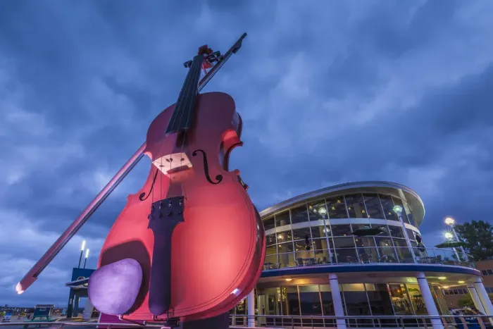 Framed Print : Canada, Nova Scotia, Sydney, The Big Fiddle at the Cruise Port Terminal, dusk Framed Print : Canada, Nova Scotia, Sydney, The Big Fiddle at the Cruise Port Terminal, dusk