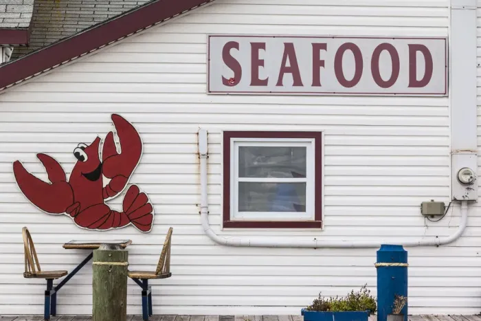 Framed Print : Canada, Prince Edward Island, Summerside, lobster cartoon on wall of seafood restaurant Framed Print : Canada, Prince Edward Island, Summerside, lobster cartoon on wall of seafood restaurant