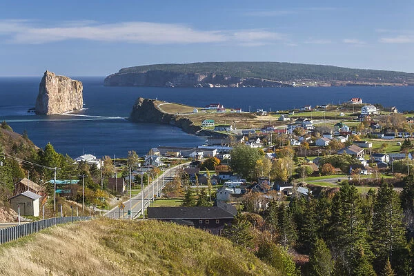 Canada, Quebec, Gaspe Peninsula, Perce, elevated view of town and Perce Rock from Rt 132