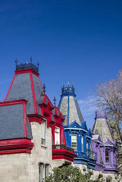 Canada, Quebec, Montreal, Carre St-Louis square, painted houses