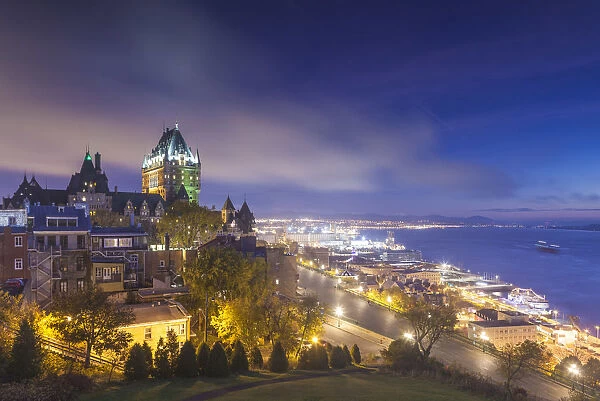 Canada, Quebec, Quebec City, elevated skyline with Chateau Frontenac Hotel, dawn, fog