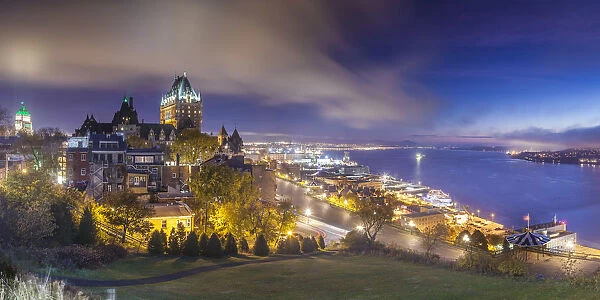 Canada, Quebec, Quebec City, elevated skyline with Chateau Frontenac Hotel, dawn, fog