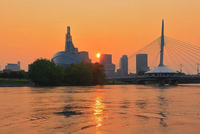 Framed Print : Canadian Museum for Human Rights (CMHR) and the Esplanade Riel Bridge and the Red River at sunset, Winnipeg, Manitoba, Canada Framed Print : Canadian Museum for Human Rights (CMHR) and the Esplanade Riel Bridge and the Red River at sunset, Winnipeg, Manitoba, Canada