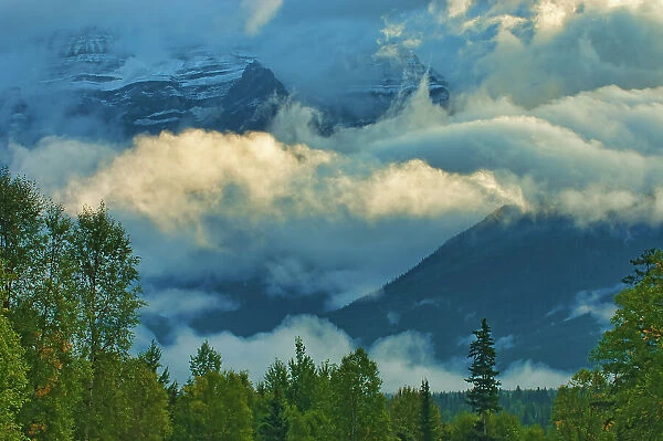 Canadian Rocky Mountains in morning fog. Mount Robson Provincial Park, British Columbia, Canada