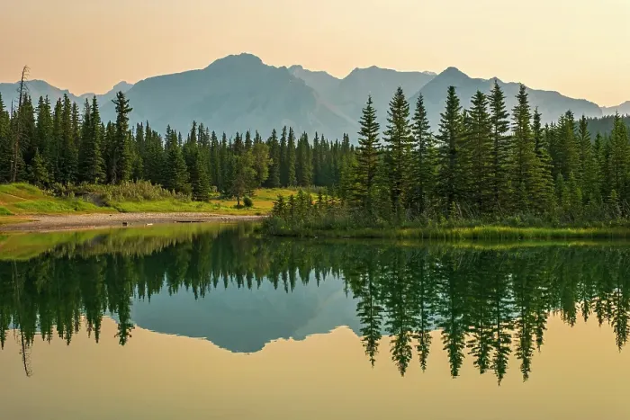 Framed Print : Canadian Rocky Mountains reflected in CAscade Pond in morning or dawn light. Banff National Park, Alberta, Canada