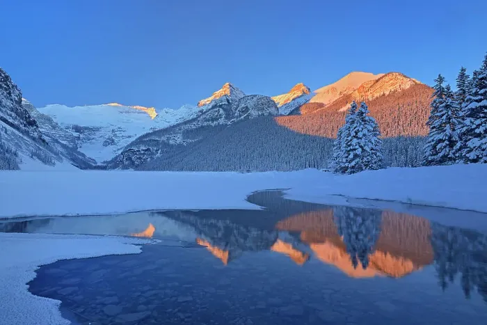 Framed Print : The Canadian Rocky Mountains reflected in Lake Louise at sunrise. Victoria Glacier on Mt. Victoria at left. Then from left to right is Mt. Whyte, The Big Beehive and Mt. Niblock and Mt. St. Piran. Banff National Park, Alberta, Canada Framed Print : The Canadian Rocky Mountains reflected in Lake Louise at sunrise. Victoria Glacier on Mt. Victoria at left. Then from left to right is Mt. Whyte, The Big Beehive and Mt. Niblock and Mt. St. Piran. Banff National Park, Alberta, Canada