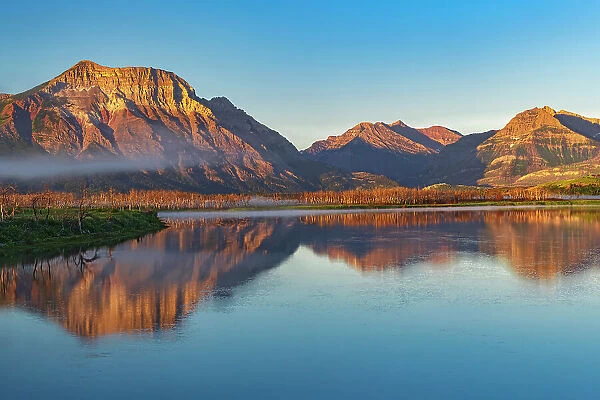 Canadian Rocky Mountains (Vimy Peak on the left) reflected in Lower Waterton Lake Waterton Lakes National Park, Alberta, Canada
