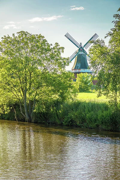 Canal with Green Mill, Greetsiel, East Frisia, Lower Saxony, Germany