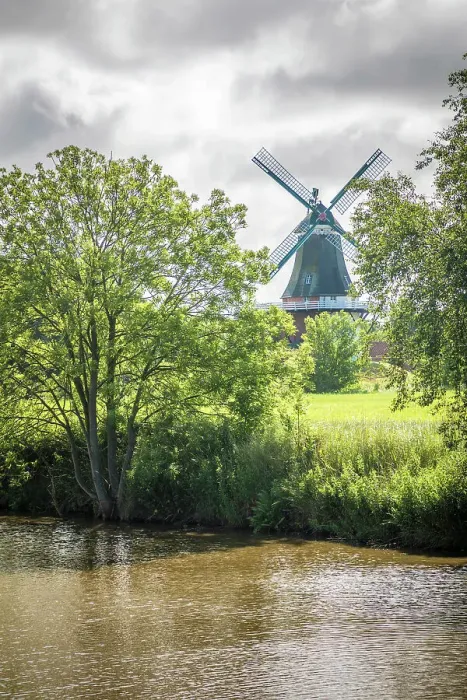 Framed Print : Canal with Green Mill, Greetsiel, East Frisia, Lower Saxony, Germany Framed Print : Canal with Green Mill, Greetsiel, East Frisia, Lower Saxony, Germany