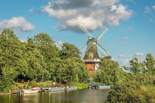 Canal and Green Mill near Greetsiel, East Frisia, Lower Saxony, Germany
