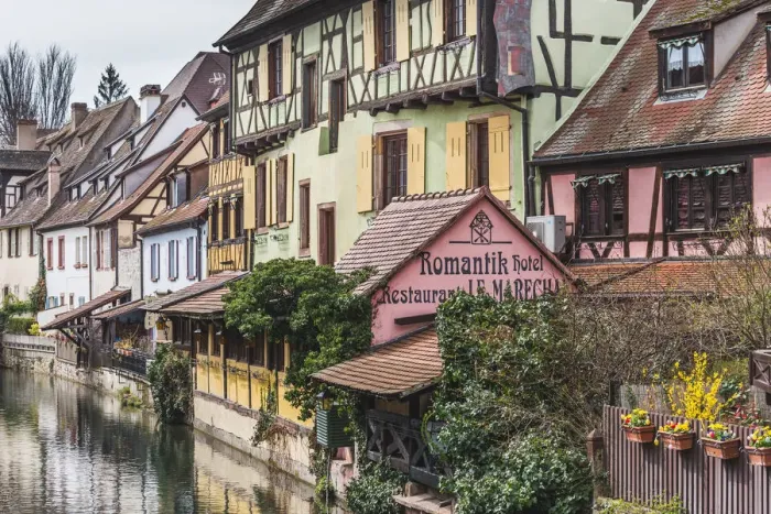 Framed Print : Canal waterfront view of traditional townhouses, Colmar, Grand Est, France Framed Print : Canal waterfront view of traditional townhouses, Colmar, Grand Est, France