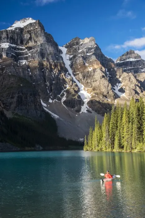Framed Print : Canoeist paddling on Moraine Lake, Banff National Park, Alberta, Canada Framed Print : Canoeist paddling on Moraine Lake, Banff National Park, Alberta, Canada
