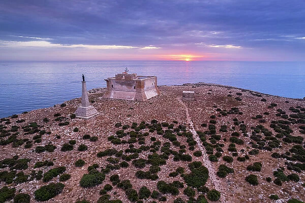 Capo Passero island at sunrise with the fortress in the foreground, Porto Palo di Capo Passero, Siracuse province, Sicily, Italy