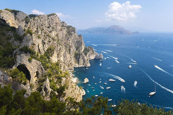Capri island coast, with Amalfi Coast on the background. Capri, Campania, Italy