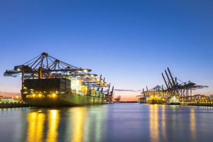 Framed Print : Cargo ships being loaded at Eurokai and Burchardkai in Hamburg Harbor at night, Waltershofer