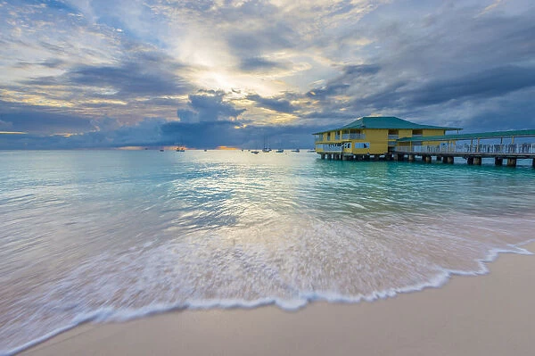 Caribbean, Barbados, Bridgetown, Carlisle Bay, Pebbles Beach at sunset