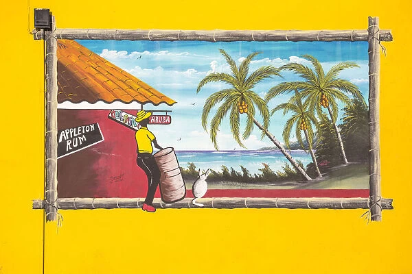 Caribbean, Netherland Antilles, Aruba, Oranjestad, Wall painting on side of Que Pasa