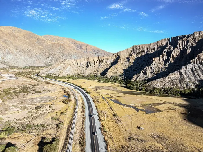 Framed Print : Cars on a road winding through a valley, Tumbaya, Jujuy, Argentina Framed Print : Cars on a road winding through a valley, Tumbaya, Jujuy, Argentina