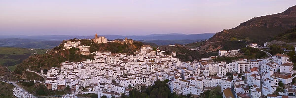 Casares illuminated at sunrise, Casares, Malaga Province, Andalusia, Spain