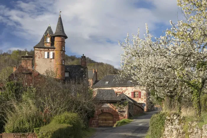 Framed Print : Castel de Maussac with blossom, Collonges-la-Rouge, Correze, Nouvelle-Aquitaine, France