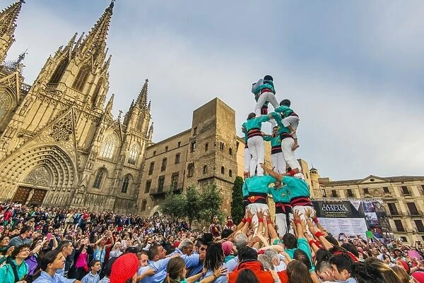 Castellers or Human Tower exhibiting in front of the Cathedral, Barcelona, Catalonia
