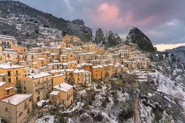 Castelmezzano after a snowfall at sunset, Potenza province, Basilicata, Italy