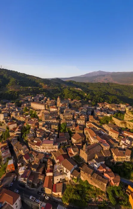 Framed Print : Castiglione di Sicilia, Sicily. Aerial view of the village with the Etna volcano in Framed Print : Castiglione di Sicilia, Sicily. Aerial view of the village with the Etna volcano in