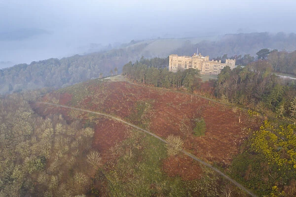 Castle Drogo on a misty winter morning, Dartmoor, Devon, England. Spring (March) 2022