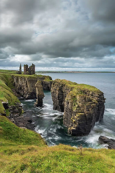 Castle Sinclair Girnigoe perched on a dramatic cliff top outcrop near Wick in North East Scotland. Autumn (September) 2022