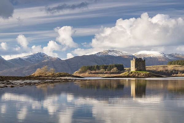 Castle Stalker reflected on Loch Laich, and inlet off Loch Linnhe in the Scottish