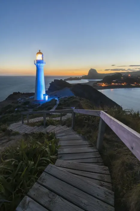 Framed Print : Castlepoint lighthouse lit in blue at dusk. Castlepoint, Wairarapa region, North Island Framed Print : Castlepoint lighthouse lit in blue at dusk. Castlepoint, Wairarapa region, North Island